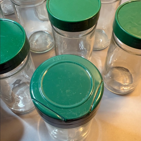 Set of 12 Vintage Glass Round Spice Jars W/ Green Lids, Approximately 4.5” Tall - Picture 8 of 8